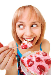 portrait of beautiful blonde girl eating cake