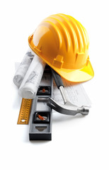 isolated hard hat with tools and blueprint on white - 39687575