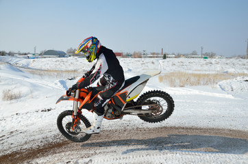 motorcycle racer lands on the front wheel © VVKSAM
