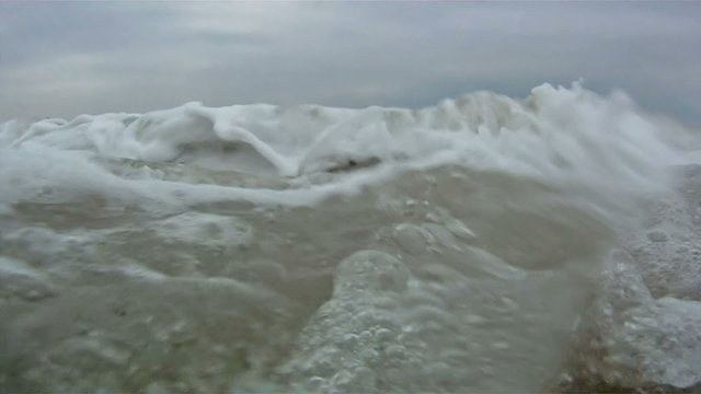 Ocean wave front on tropical sand beach
