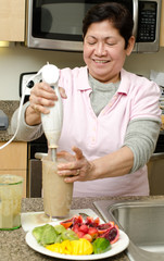Senior asian filipino woman preparing food