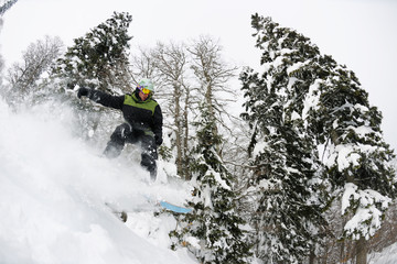 snowboarder on fresh deep snow
