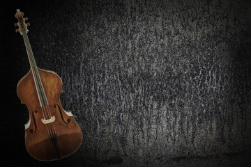 Fototapeta na wymiar Old violin on grunge background