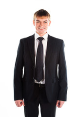 A young and successful business man in a dark business suit