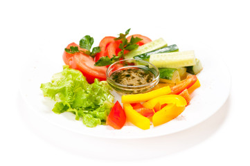 Fresh summer salad on white plate