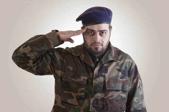 A soldier salutes - clipping path included