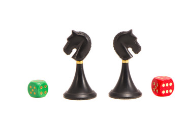 isolated two chess black knightes and dices