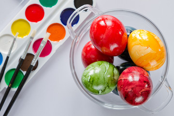 ester eggs with brush and paint