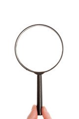Fingers holding magnifying glass