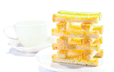 Buttered bread with cup of coffee