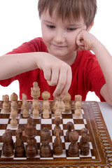 Boy playing chess