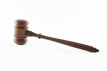 Wooden judge hammer isolated on white background