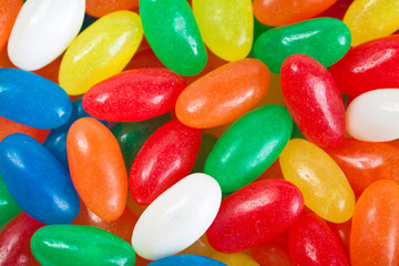 Multi colored jelly beans background. Close up
