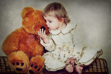 little girl with toy bear - 39716995