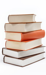 A stack of books on a white background.