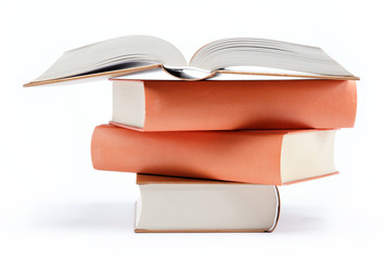 A stack of books on a white background.