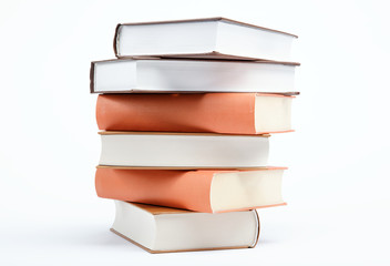 A stack of books on a white background.