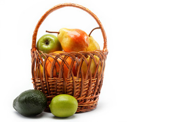 fruits in basket isolated on a white background.