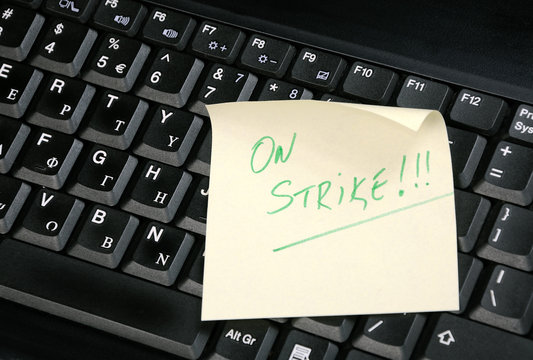 keyboard with 'on strike' on it.
