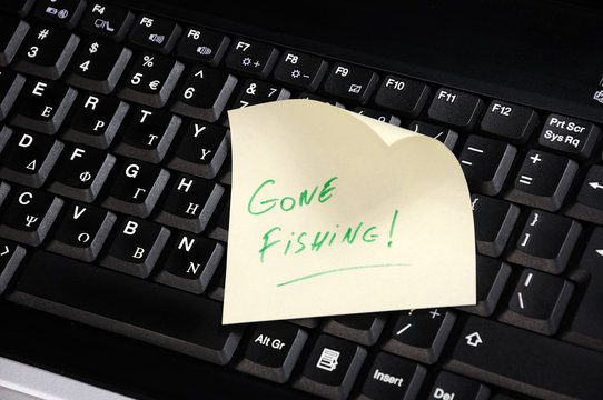 keyboard with 'gone fishing' on it.