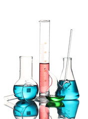Different laboratory glassware with color liquid and with