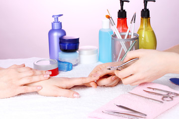 Manicure process in beautiful salon