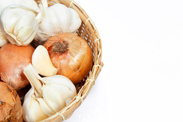 garlic and onions in a basket