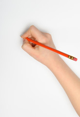 Hand with red pencil