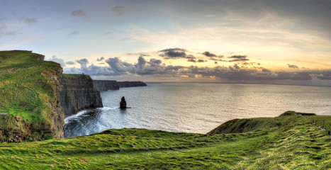 Panoramic view of Cliffs of Moher at sunset in Ireland. - obrazy, fototapety, plakaty