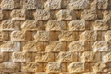 Textured Interlocking Block Wall in Morning Light