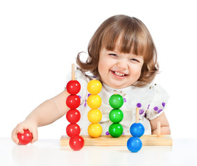 Obraz premium little girl playing with balls