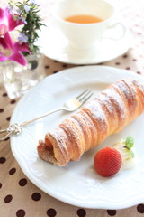 Homemade custard pie and strawberry with Tea on background