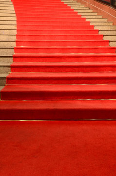 Stairs covered with red carpet