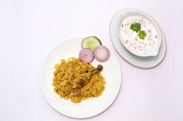 biryani served on a white plate