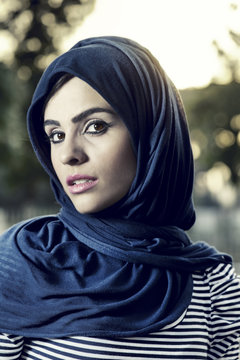beautiful arabian lady wearing traditional islamic outfit