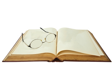 opened book with eye glasses isolated on white background