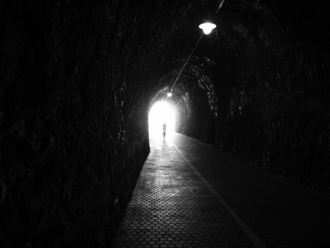 Human silhouette in tunnel, Light at End of Tunnel