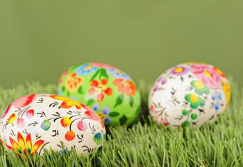 Decorated easter eggs on yellow background