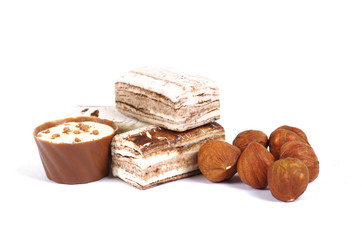 Chocolate and nuts over white
