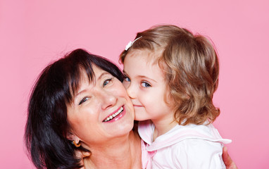 Senior woman and little girl