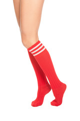 a close up of female legs with soccer socks