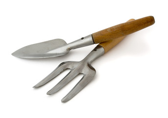Old steel garden trowel and fork