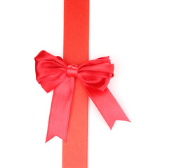 Red satin bow and ribbon isolated on white