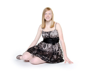 Naklejka premium Cute blond teen girl on white background