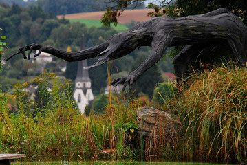 water dispenser at the swimming pond looking like a monster