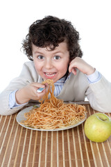 Adorable child hungry at the time of eating