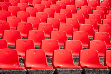 Red stadium seats on the stand