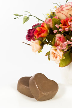 Chocolate heart and rose in the Valentine's Day