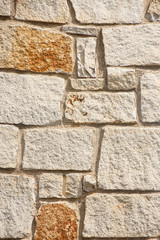 Stone Block Wall with Rust Spots