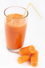 A glass of fresh carrot juice